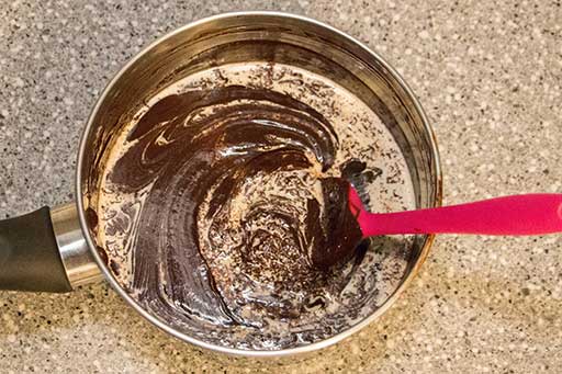 Add whipping cream to the chocolate mixture and mix it.