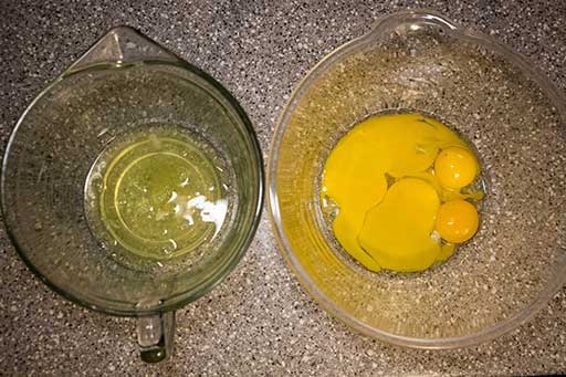 Separate yolks from egg whites in different bowls