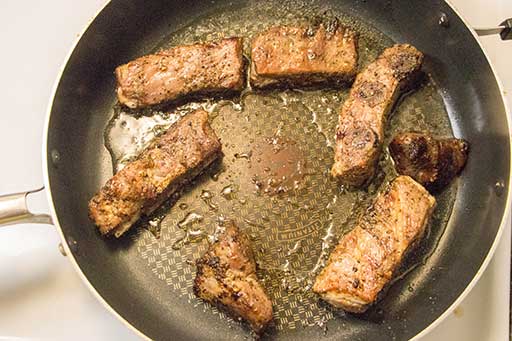 Add lard on preheated skillet and place all ribs. Fry until golden brown on all sides or do ribs on a BBQ until they fried on all sides.